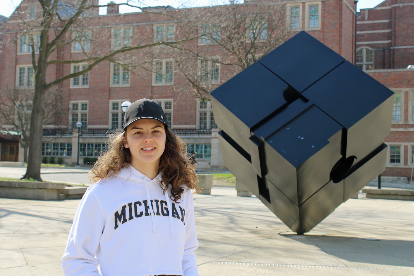 Posing next to the Cube