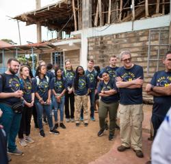 Students and faculty participating in study abroad with matching t-shirts