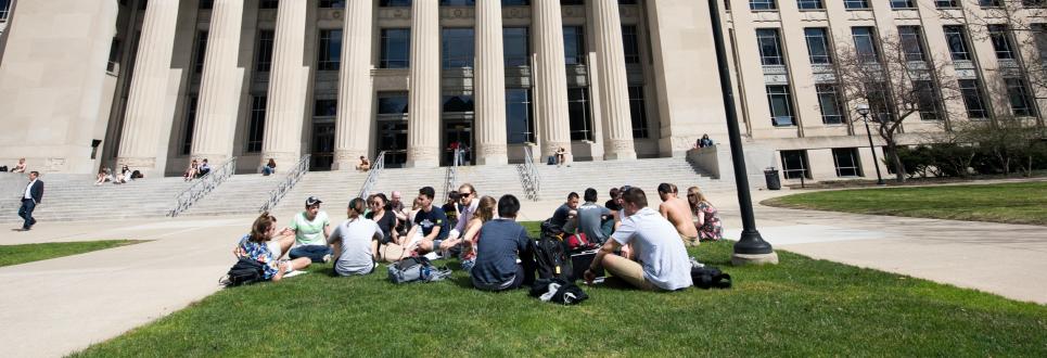 A class being held on the lawn of Angell Hall