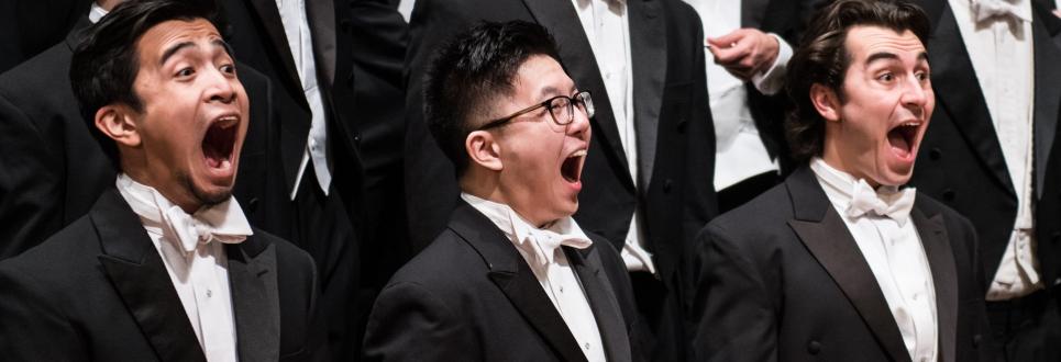 Students singing in the Men's Glee Club