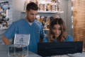 two people looking at a computer screen